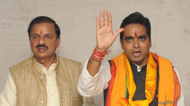 Workers have been upset over BJP tickets to turncoats and to home minister Rajnath Singh’s son, Pankaj (right). (Burhaan Kinu/HT Photo) Workers have been upset over BJP tickets to turncoats and to home minister Rajnath Singh’s son, Pankaj (right). (Burhaan Kinu/HT Photo)
