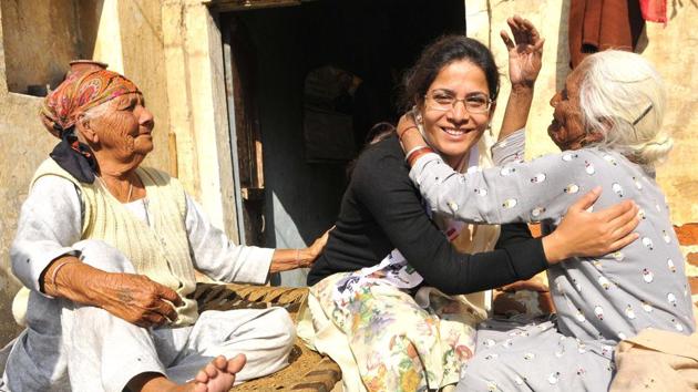 Dressed in a simple suit, sports shoes and dupatta around her neck, AAP’s candidate from Ghanaur Anu Randhawa looks every bit the ‘aam aadmi’ her party stands for. (Keshav Singh/HT Photo) Dressed in a simple suit, sports shoes and dupatta around her neck, AAP’s candidate from Ghanaur Anu Randhawa looks every bit the ‘aam aadmi’ her party stands for. (Keshav Singh/HT Photo)
