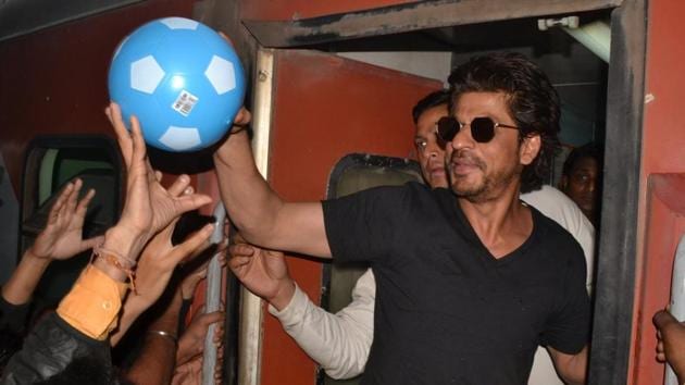 Shah Rukh Khan greets his fans at Mathura railway station while travelling by train to Delhi for promotion of his upcoming film Raees. (IANS) Shah Rukh Khan greets his fans at Mathura railway station while travelling by train to Delhi for promotion of his upcoming film Raees. (IANS)