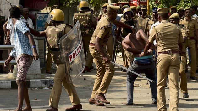 Police resort to lathicharge to disperse Jallikattu protesters near Marina Beach in Chennai on Monday. (PTI) Police resort to lathicharge to disperse Jallikattu protesters near Marina Beach in Chennai on Monday. (PTI)