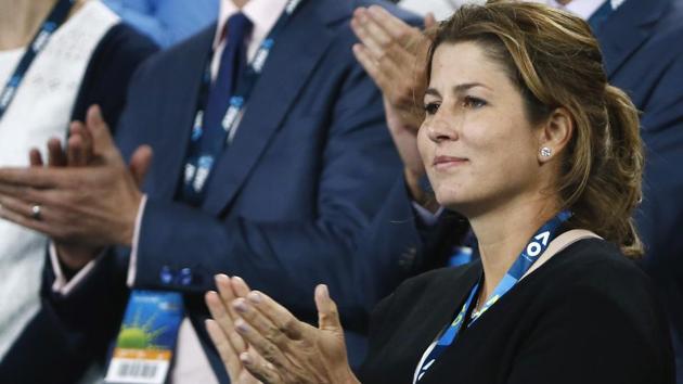 Mirka Federer, wife of Switzerland's Roger Federer, celebrates after he won his Men's singles quarter-final match. (REUTERS)