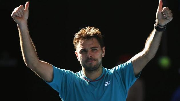 Switzerland's Stan Wawrinka celebrates winning his Men's singles quarter-final match against France's Jo-Wilfried Tsonga. (REUTERS)