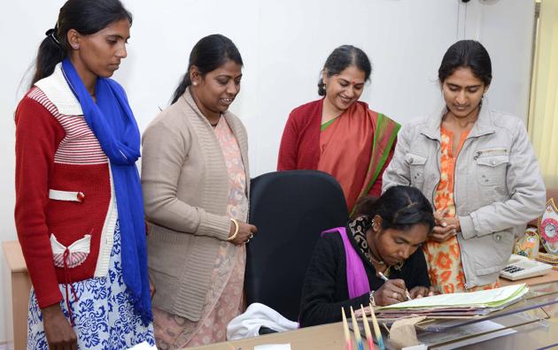 A winner of the Garima Award acts as a minister at the Rajasthan woman and child development minister Anita Bhadel office in Jaipur on Tuesday.(HT Photo.)