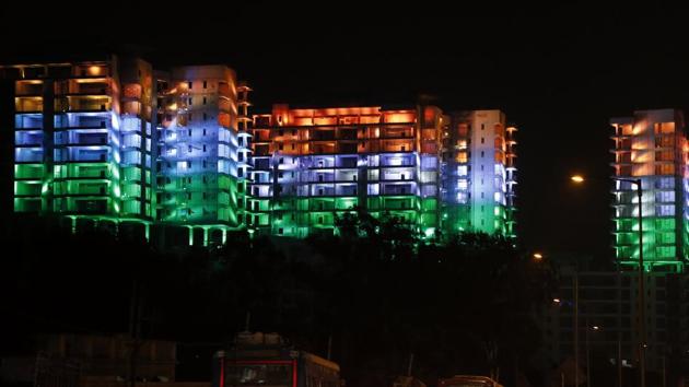 Under-construction buildings lit up in the colours of the Indian flag on the eve of Republic Day in Bangalore. (AP photo) Under-construction buildings lit up in the colours of the Indian flag on the eve of Republic Day in Bangalore. (AP photo)