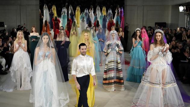 Fashion designer Alexis Mabille acknowledges applause at the end of his Haute Couture Spring-Summer 2017 fashion collection presented in Paris on Tuesday. (AP) 