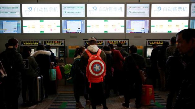 Passengers wait to buy train ticket at Shanghai's Hongqiao Railway Station as hundreds of millions of Chinese travel home for Lunar New Year in Beijing and Shanghai, in Shanghai, China January 25, 2017. REUTERS/Aly Song (REUTERS) Passengers wait to buy train ticket at Shanghai's Hongqiao Railway Station as hundreds of millions of Chinese travel home for Lunar New Year in Beijing and Shanghai, in Shanghai, China January 25, 2017. REUTERS/Aly Song (REUTERS)