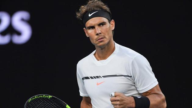 Rafael Nadal reacts after a winning a point against Milos Raonic in an Australian Open quarter-final match.(AFP)