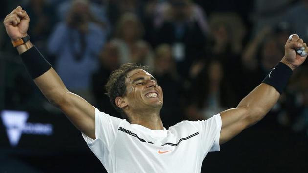 Rafael Nadal celebrates after winning his men's singles quarterfinal match against Canada's Milos Raonic on Wednesday. He will play Grigor Dimitrov in the final four. Get highlights and tennis score of Rafael Nadal vs Milos Raonic match here.(REUTERS)