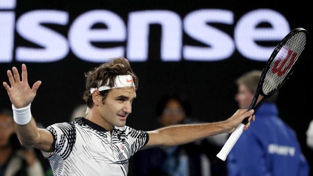 Roger Federer celebrates after defeating Stan Wawrinka in their semifinal match at the Australian Open. (AP)