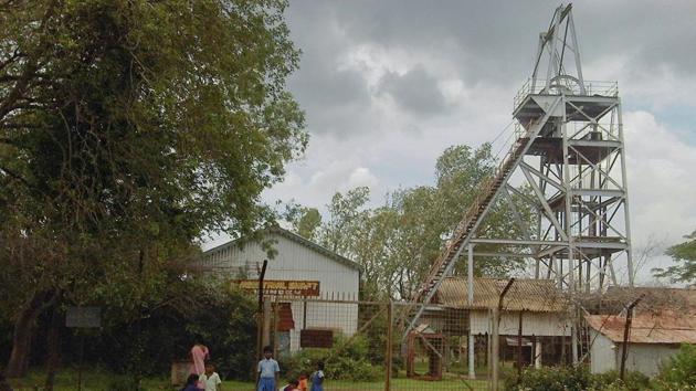 Schoolchildren play in front of an abandoned shaft at Kolar Gold Fields, in Karnataka. (Reuters) Schoolchildren play in front of an abandoned shaft at Kolar Gold Fields, in Karnataka. (Reuters)