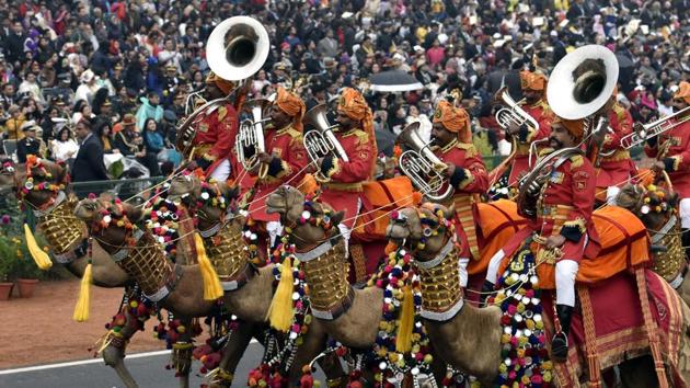 The colourful contingent of Border Security Force men riding regally decked up camels at the Rajpath got a huge round of applaud from the spectators during the Republic Day Parade. (Mohd Zakir/HT PHOTO)