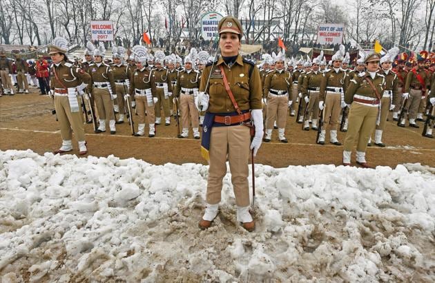 The women contingent of Jammu and Kashmir Police stand at attention during the 68th Republic Day parade at the Bakshi Stadium in Srinagar on Thursday.(PTI)