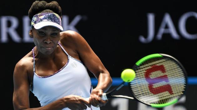 Venus Williams hits a return against Coco Vandeweghe of the US during their women's singles semi-final. (AFP)