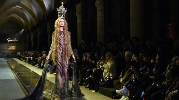 A model presents a creation by Guo Pei during the 2017 spring/summer Haute Couture collection on Thursday. (AFP) A model presents a creation by Guo Pei during the 2017 spring/summer Haute Couture collection on Thursday. (AFP)