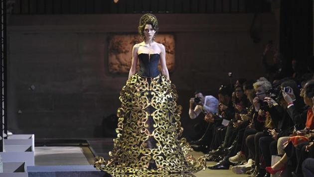 A model presents a creation by Guo Pei during the 2017 spring/summer Haute Couture collection on Thursday. (AFP) A model presents a creation by Guo Pei during the 2017 spring/summer Haute Couture collection on Thursday. (AFP)