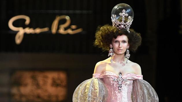 A model presents a creation by Guo Pei during the 2017 spring/summer Haute Couture collection on Thursday. (AFP) A model presents a creation by Guo Pei during the 2017 spring/summer Haute Couture collection on Thursday. (AFP)