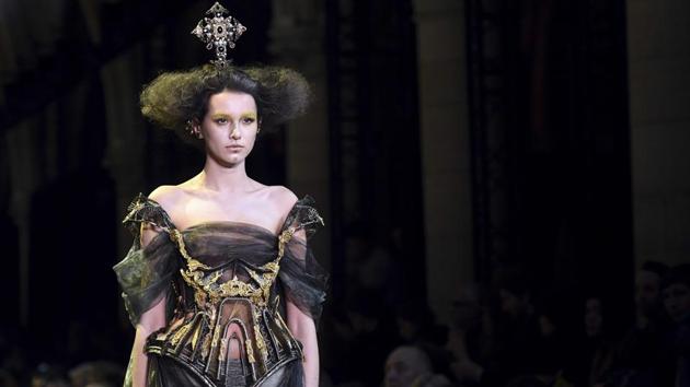 A model presents a creation by Guo Pei during the 2017 spring/summer Haute Couture collection on Thursday. (AFP) A model presents a creation by Guo Pei during the 2017 spring/summer Haute Couture collection on Thursday. (AFP)