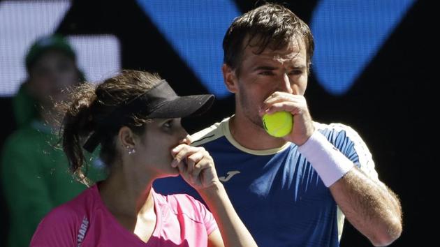 Sania Mirza (left) and Ivan Dodig of Croatia reached the mixed doubles final of the Australian Open on Friday.(AP)