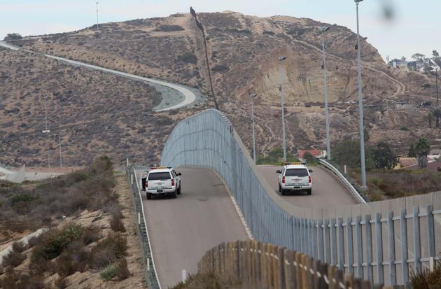 Border patrol agents patrolling the United States-Mexico border wall. (AFP File Photo)