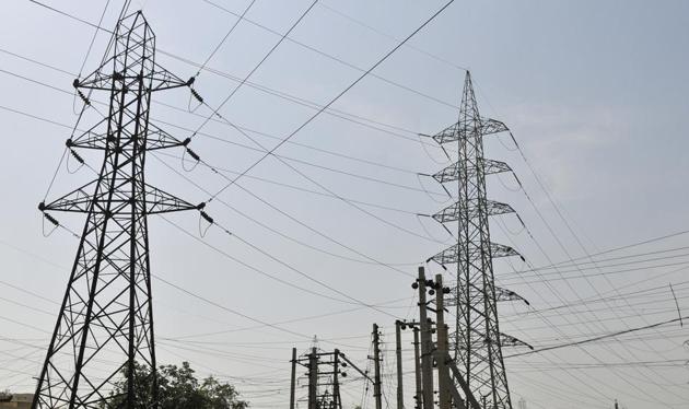 The DHBVN officials could not begin repair work and restore power till the rain stopped. (HT PHOTO) The DHBVN officials could not begin repair work and restore power till the rain stopped. (HT PHOTO)