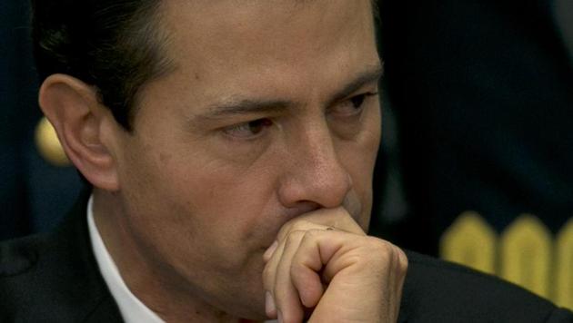 Mexico's President Enrique Pena Nieto in Mexico City on January 23, 2017. President Nieto cancelled his trip to Washington scheduled next week amidst a growing spat with US president Donald Trump over the building of a border wall. (AP) Mexico's President Enrique Pena Nieto in Mexico City on January 23, 2017. President Nieto cancelled his trip to Washington scheduled next week amidst a growing spat with US president Donald Trump over the building of a border wall. (AP)