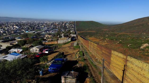 Urban fencing on the border between the US and Mexico at El Nido del Aguila, outskirts of Tijuana, northwestern Mexico.(AFP File Photo) Urban fencing on the border between the US and Mexico at El Nido del Aguila, outskirts of Tijuana, northwestern Mexico.(AFP File Photo)