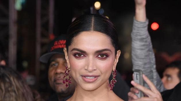 Deepika Padukone’s wine-hued eyes are the perfect inspiration for a winter-perfect beauty look.(AFP/Angela Weiss)