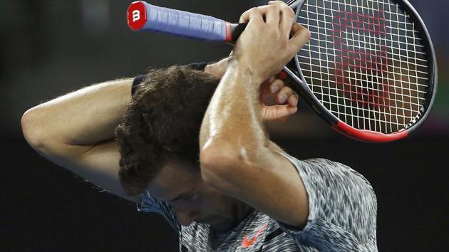 Grigor Dimitrov reacts during his Men's singles semi-final match against Spain's Rafael Nadal. (REUTERS)