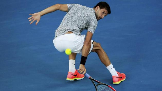 Grigor Dimitrov in action during his Men's singles semi-final match against Rafael Nadal. (REUTERS)