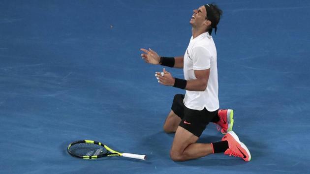 Rafael Nadal falls onto the court as he celebrates after defeating Grigor Dimitrov in Australian Open semi-final. (REUTERS) Rafael Nadal falls onto the court as he celebrates after defeating Grigor Dimitrov in Australian Open semi-final. (REUTERS)
