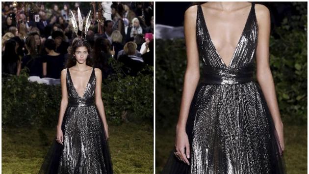 Christian Dior: The gowns in Maria Grazia Chiuri’s ethereal collection for Dior Couture created a real buzz. These feminine creations shine with zodiac signs and embroidered sequins, plus pleats, mesmerizing reflections and metallic shades. (AFP) Christian Dior: The gowns in Maria Grazia Chiuri’s ethereal collection for Dior Couture created a real buzz. These feminine creations shine with zodiac signs and embroidered sequins, plus pleats, mesmerizing reflections and metallic shades. (AFP)