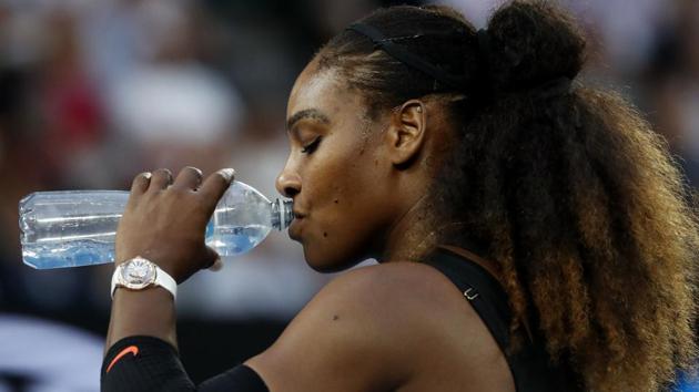 Serena Williams takes a drink during a break in her final against sister Venus. (AP)