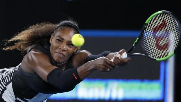 Serena Williams reaches for a a backhand during the women's final against Venus on Saturday. (AP)