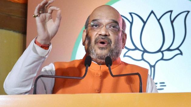 BJP President Amit Shah at the release of party manifesto for the upcoming Uttar Pradesh assembly elections in Lucknow on Saturday.(PTI) BJP President Amit Shah at the release of party manifesto for the upcoming Uttar Pradesh assembly elections in Lucknow on Saturday.(PTI)