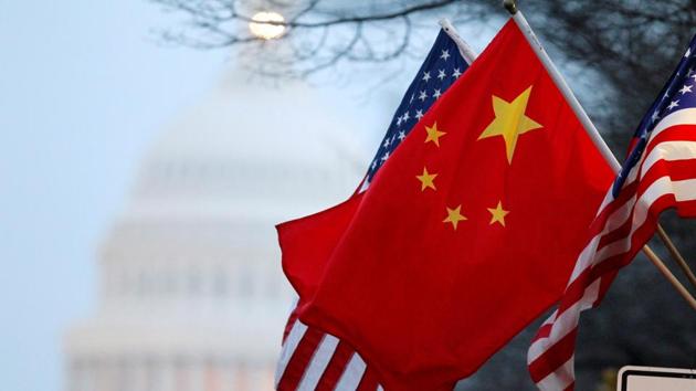 The People's Republic of China flag and the US Stars and Stripes fly along Pennsylvania Avenue near the US Capitol in Washington, DC.(Reuters File Photo) The People's Republic of China flag and the US Stars and Stripes fly along Pennsylvania Avenue near the US Capitol in Washington, DC.(Reuters File Photo)