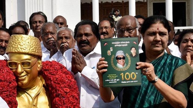 AIADMK general secretary VK Sasikala releases manifesto of party founder the late M G Ramachandran on his 100th birth anniversary celebration, at party headquarters in Chennai on Tuesday.(PTI Photo)