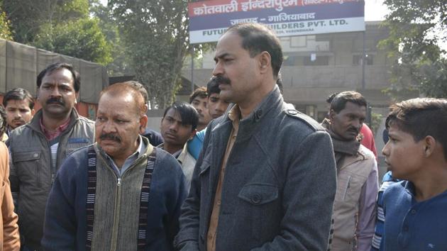 Unidentified relatives and friends of the four people who were crushed by an Audi car in Ghaziabad are seen outside a hospital in the UP city. (Sakib Ali/ HT Photo) Unidentified relatives and friends of the four people who were crushed by an Audi car in Ghaziabad are seen outside a hospital in the UP city. (Sakib Ali/ HT Photo)