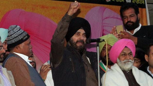 Congress leader Navjot Singh Sidhu along with party leaders addressing a rally at Galib Kalan, Jagraon, in Ludhiana on Friday .(JS Grewal/HT Photo)