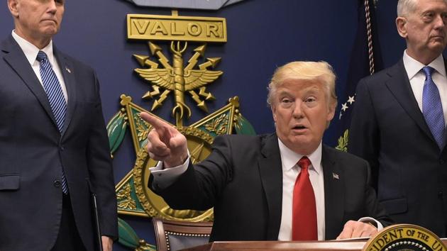 US President Donald Trump speaks after signing executive orders alongside US Defense Secretary James Mattis (right) on January 27, 2016 at the Pentagon in Washington, DC.(AFP Photo)