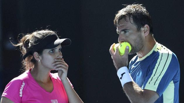 Abigail Spears-Jan Sebastian Cabal beat Sania Mirza-Ivan Dodig 6-2,6-4 in the final to win the Australian Open mixed doubles title. (AP) Abigail Spears-Jan Sebastian Cabal beat Sania Mirza-Ivan Dodig 6-2,6-4 in the final to win the Australian Open mixed doubles title. (AP)