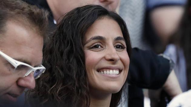 Rafael Nadal’s girlfriend Xisca Perello beams before the start of the men's final on Sunday. (AP)