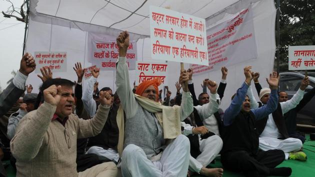 More than 50 members of the community assembled in a tent at a market-area next to Atul Kataria Chowk, and raised anti-government slogans holding placards.(Parveen Kuamr/HT Photo)