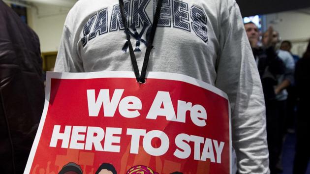 Immigrant rights advocates demonstrate against President-elect Donald Trump's immigration policies, in Washington. (AP photo) Immigrant rights advocates demonstrate against President-elect Donald Trump's immigration policies, in Washington. (AP photo)