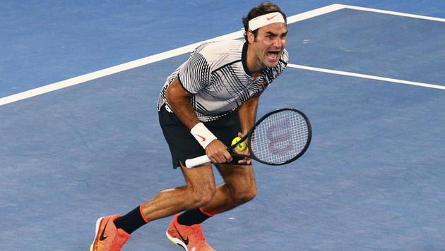 THAT MOMENT! Roger Federer celebrates winning the championship point. He won 6-4, 3-6, 6-1, 3-6, 6-3. (REUTERS)