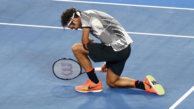 Federer breaks down in tears after winning an epic final Rafael Nadal. (REUTERS)