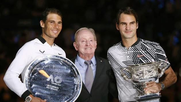 Roger Federer (right) and Rafael Nadal (left) pose with Australian great Rod Laver. (REUTERS)
