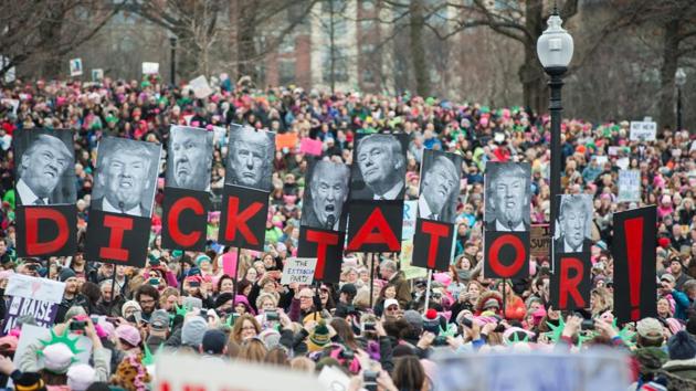 Protesters march across Boston Commons during the Boston Women's March for America on January 21, 2017. Led by women in pink "pussyhats," hundreds of thousands of people packed the streets of Washington and other cities in the US on Saturday in a massive outpouring of defiant opposition to America's new president, Donald Trump. (yan McBride / AFP) Protesters march across Boston Commons during the Boston Women's March for America on January 21, 2017. Led by women in pink "pussyhats," hundreds of thousands of people packed the streets of Washington and other cities in the US on Saturday in a massive outpouring of defiant opposition to America's new president, Donald Trump. (yan McBride / AFP)