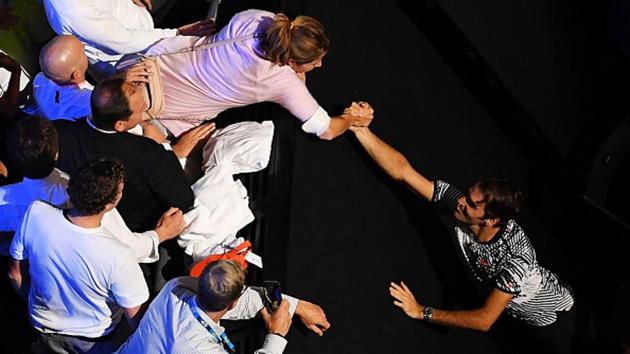 Mirka congratulates her husband after his historic feat. (Getty Images)