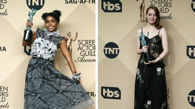 Actors Janelle Monae and Emma Stone pose backstage with their respective awards. Monae won the award for Outstanding Performance by a Cast in a Motion Picture for Hidden Figures and Stone for Outstanding Performance by a Female Actor in a Leading Role for La La Land. (REUTERS)