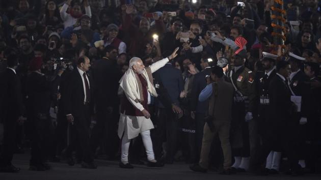Doing the rounds: Prime Minister Narendra Modi waves at the crowd after the ceremony in New Delhi. (Virendra Singh Gosain/HT photo) Doing the rounds: Prime Minister Narendra Modi waves at the crowd after the ceremony in New Delhi. (Virendra Singh Gosain/HT photo)